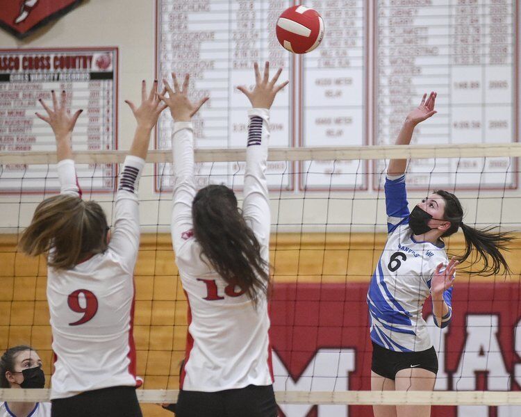 SERVE'S UP: Danvers volleyball welcomes Masconomet to NEC with four set triumph